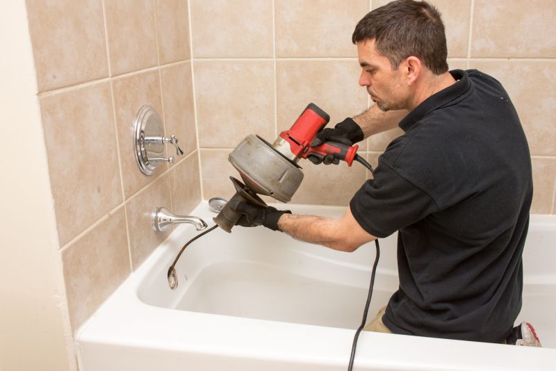 Worker Installing Bathtub